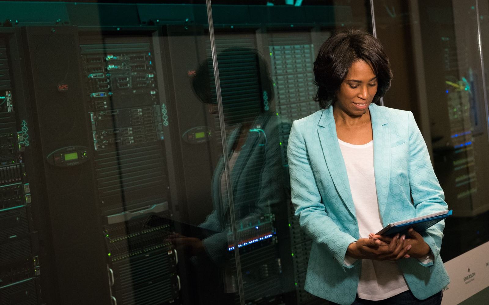 IT professional reviewing systems in a data center - Amped Marketing serves MSPs and IT providers